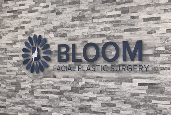 Bloom Facial Plastic Surgery logo sign