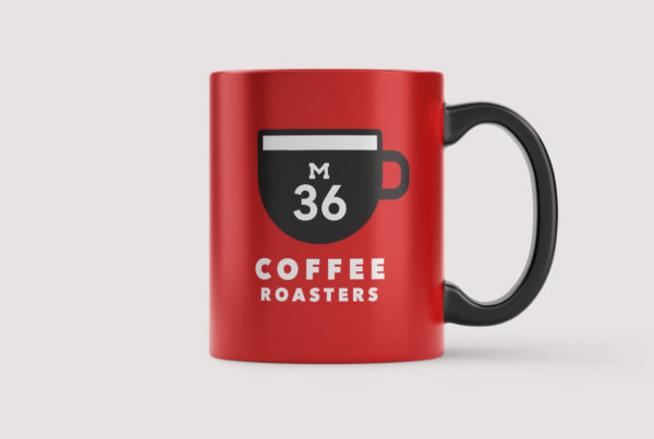 M36 Coffee Roasters logo design on a coffee mug